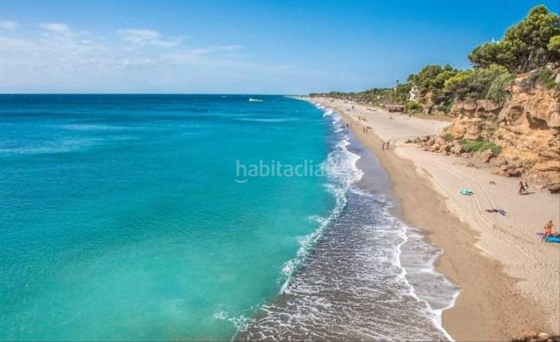 Foto 8147c7b6-b1c5-42e3-908c-f09b3d4204a6. Casa aparellada amb aparcament piscina a Platja de Mont-roig Mont-roig del Camp