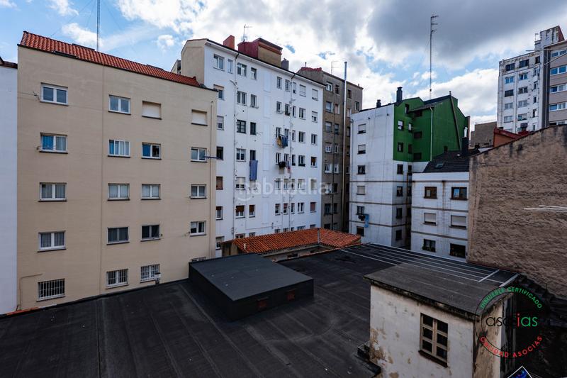 Foto 21b8041c-c3c7-4686-8e64-b8a293ce91aa. Piso en Gijón - calle padilla 5 4 dormitorios, 2 baños, salón, cocina y plaza de garaje con espacio, luz y potencial en pleno Centro de la ciudad en Gijón