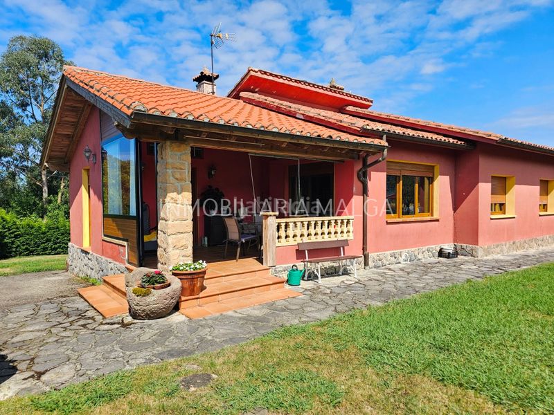 Foto ae271baa-c12a-4acc-8864-b3e6e658a633. Casa con camino riscaldamento in Colunga