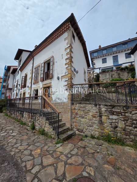 Foto f6d81bd9-cda8-4114-8d6e-f30865eb2597. Casa con camino riscaldamento in Colunga