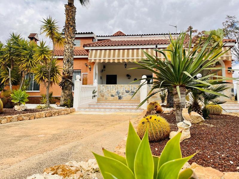 Foto 6c69ae5d-0c43-42f6-b99e-4156655c1e21. Chalet con riscaldamento parcheggio piscina in Peña de las Águilas Elche / Elx