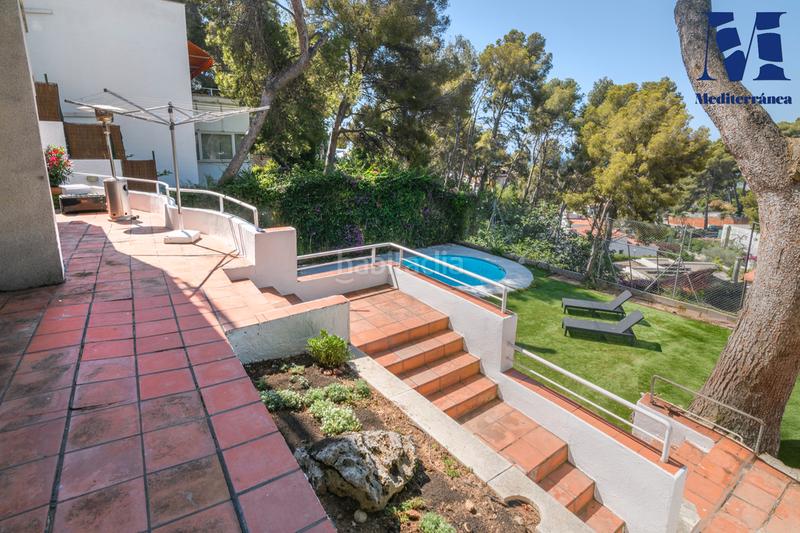 Foto 9f7d2463-774b-4e13-bfa5-714e42c2320a. Casa amb xemeneia calefacció aparcament piscina a Castelldefels