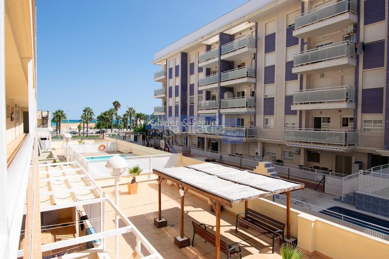 Foto 180a91a8-e45c-4071-b302-8b14672fa437. Piso a solo 125m del mar apartamento con terraza, piscina y garaje en playa en Moncofa