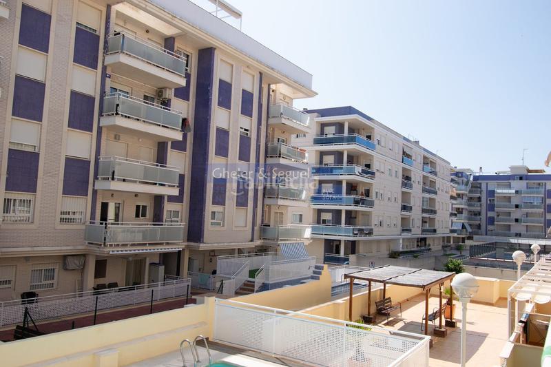 Foto 79abfb8a-ad73-40d2-9f11-73045eb7fbcd. Piso a solo 125m del mar apartamento con terraza, piscina y garaje en playa en Moncofa