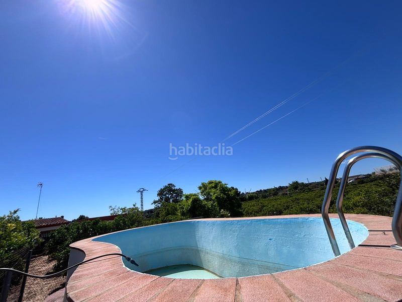 Foto 20826c2b-16ea-485c-8bd7-dc9e9df55e88. Casa amb xemeneia piscina a Cumbres de Calicanto Torrent