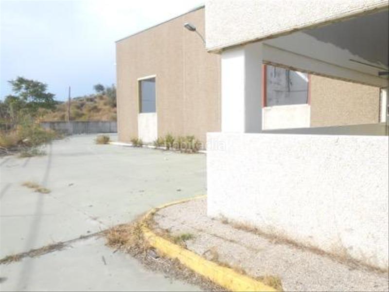 Foto adba526a-9bf2-484e-9d7b-8f61566aeded. Industrial building in Benamocarra