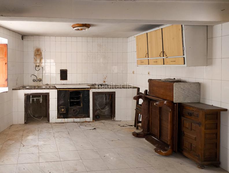 Foto f4953b45-19bc-425f-a116-23c2b688c794. Casa aparellada a Molledo