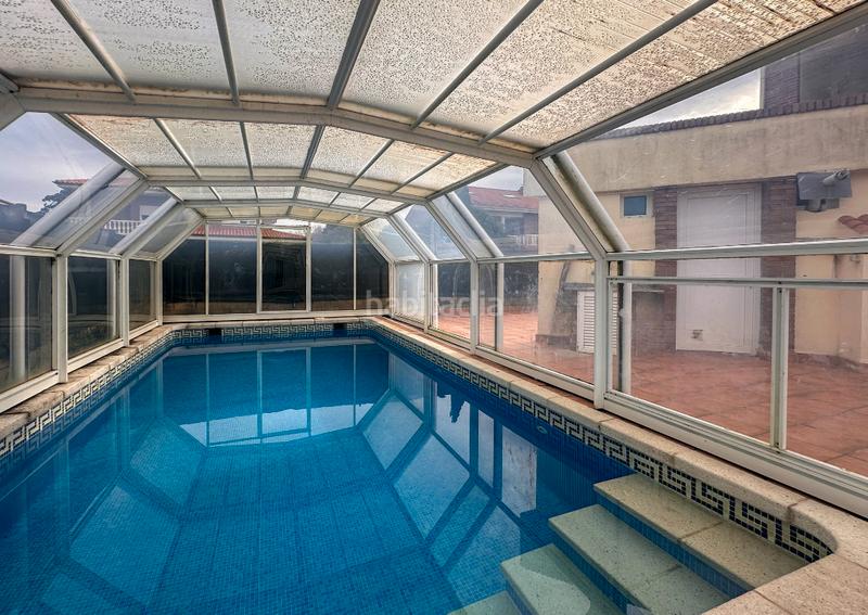 Foto fbc41ba0-231e-47ef-8745-cc0d45cc875e. Xalet amb xemeneia calefacció aparcament piscina a Santa Cruz de Bezana