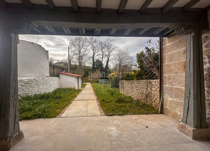 Foto 7db96a81-bdfe-43fc-83ea-722a50921b6c. Casa aparellada a Alfoz de Lloredo