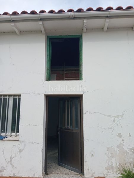 Foto 48e3a447-df42-49b9-8ef9-c60aa8e1d643. Casa adossada a Reocín
