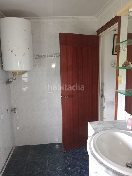 Foto edcacb56-c720-47b4-9b26-f6d18a918b2a. Casa adossada a Reocín