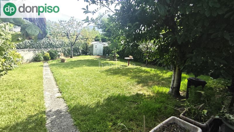Foto dca655d0-dd4a-4fac-87e4-3aac40fc5941. Casa aparellada amb aparcament a Corrales de Buelna (Los)