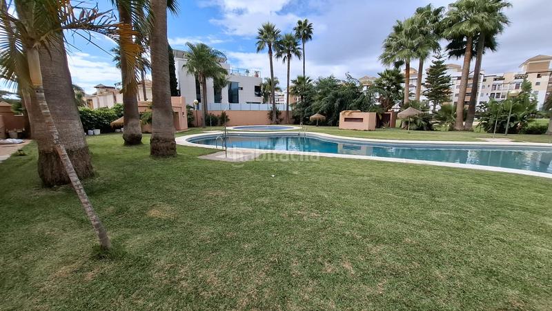 Foto dec06d1c-7362-4a0f-ad0d-65c9c034cd2a. Chalet avec parking dans Motril ciudad Motril