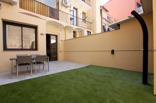 Erdgeschoss  Carrer tortella. Vivienda de diseño con patio privado en el corazón de poblenou,