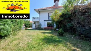 Casa  La pola. Suesa. chalet pareado con jardín