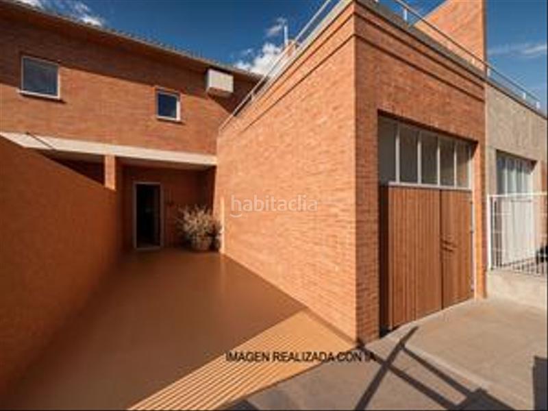 Foto a962dcc6-c14e-47aa-8463-229f38e0ab17. Haus mit heizung parking in Castejón