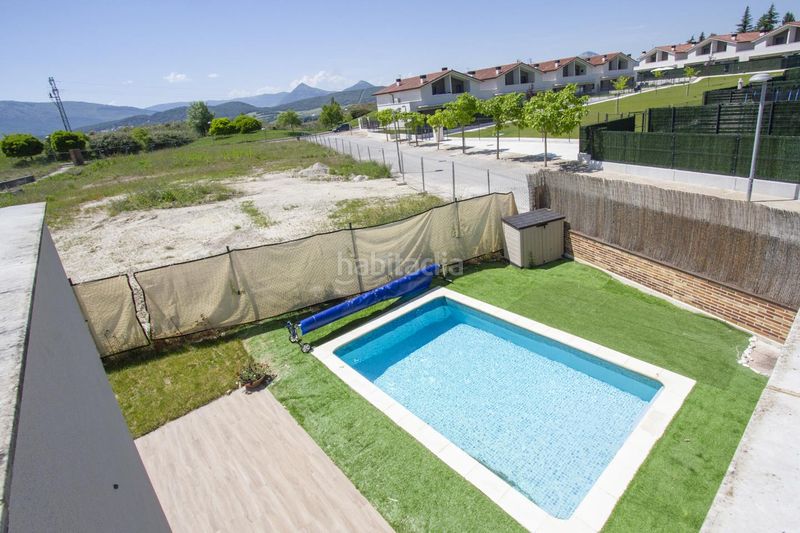 Foto 34a71a35-5dce-4fb0-ae57-6f0529c91c6e. Casa aparellada amb calefacció aparcament piscina a Iza