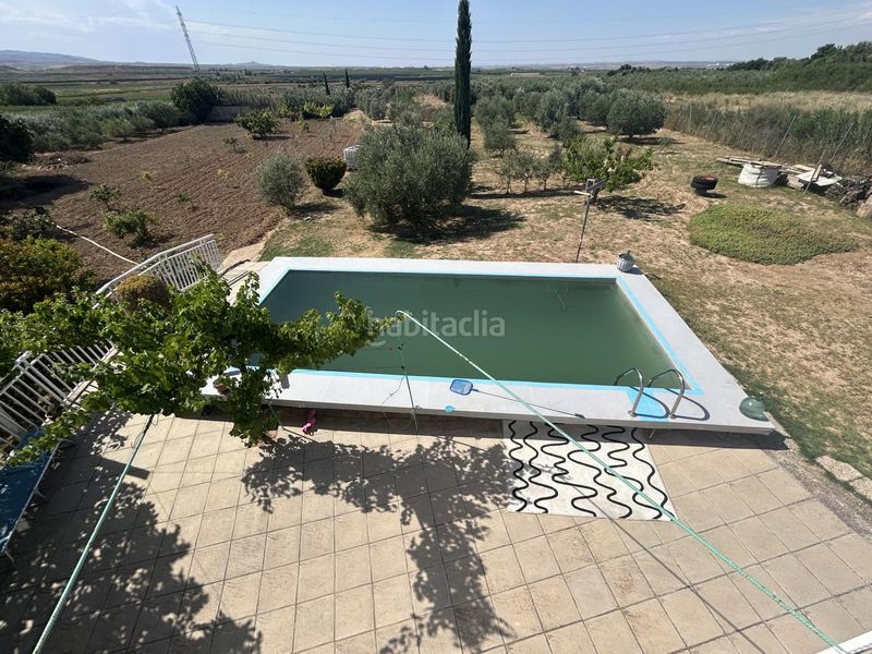 Foto f3073369-26f2-4711-b269-8ac451d0fee7. Masia amb piscina a Corella