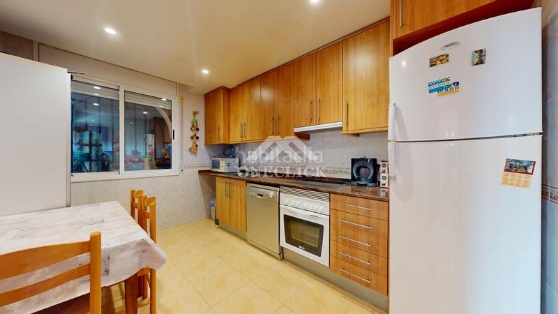 Foto 3356d1e8-f05a-408e-ad0c-982f0624c906. Casa aparellada a carrer c 13 a Platja de Mont-roig Mont-roig del Camp