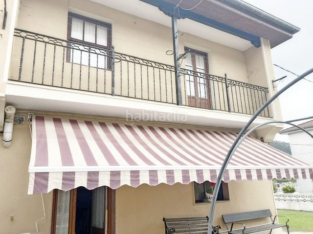 Foto 52865cf1-24ab-4203-847c-36d2234f6e2f. Casa adossada amb aparcament a Reocín