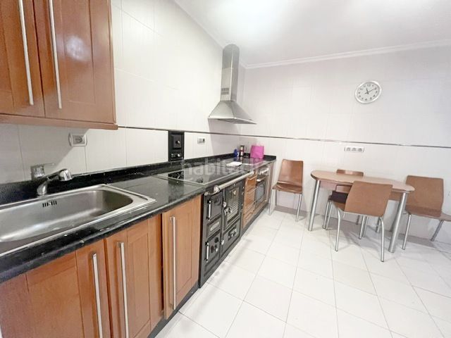 Foto b0bb9f5c-9c33-42c5-980e-48ac7b44154e. Casa adossada amb aparcament a Reocín
