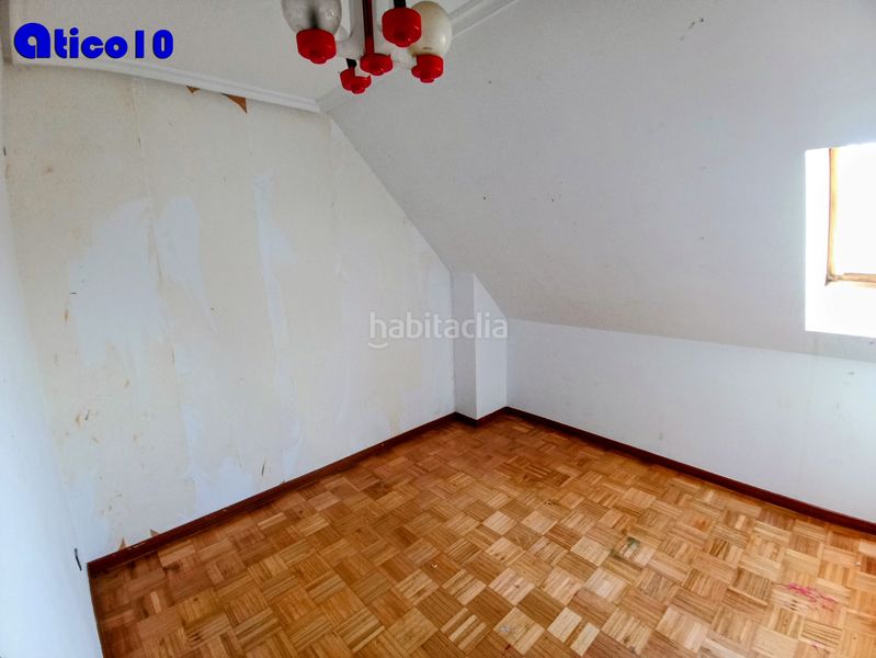 Foto 59419d5d-0f92-4092-ae16-1b68aeec681d. Àtic amb xemeneia calefacció a Ciudad Naranco - Prados de La Fuente Oviedo