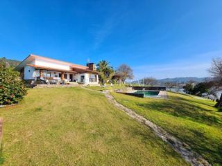 Casa  El requexu. Chalet sobre la ría en el puntal, villaviciosa.