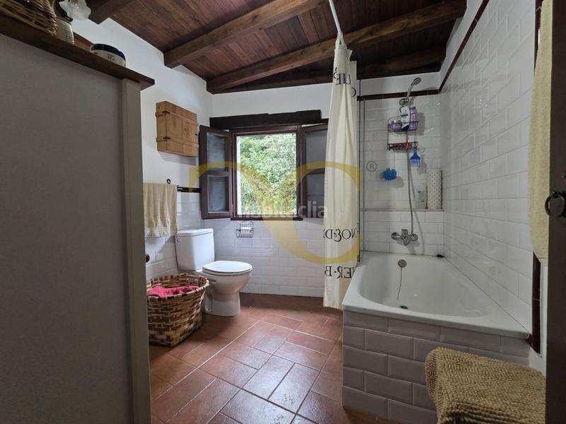Foto 11192cd8-911f-4f50-93f6-7170491e3d8b. Casa adosada exclusiva preciosa casa tradicional con jardín a 5 kilómetros de la playa. en Llanes