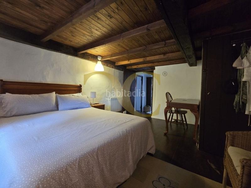 Foto f16f9ff1-c6bc-480e-8d29-9c2f8093fc1b. Casa adosada exclusiva preciosa casa tradicional con jardín a 5 kilómetros de la playa. en Llanes