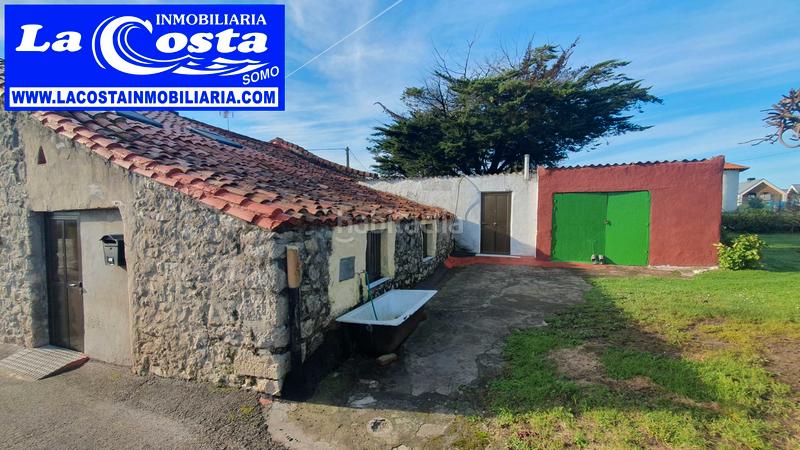 Foto e6c58f79-8216-4837-b801-2946f7f53b1f. Reihenhaus in Somo Ribamontán al Mar