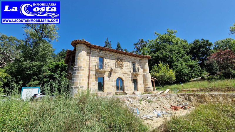 Foto 297ad90b-d813-4773-9622-572a300fac88. Xalet amb xemeneia calefacció a Ribamontán al Monte