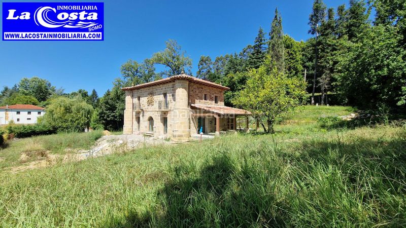Foto bd3d5f32-8332-4e9b-8e7f-f2111b613e29. Xalet amb xemeneia calefacció a Ribamontán al Monte
