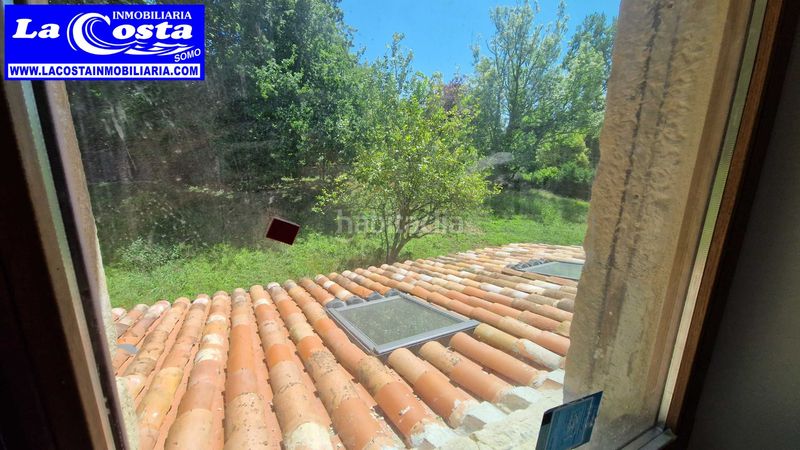 Foto cdccf433-2a39-4deb-824a-95f7402e6ddb. Xalet amb xemeneia calefacció a Ribamontán al Monte