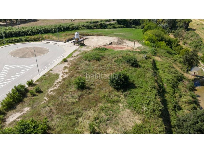 Foto 0955dc9f-6405-4d01-893d-0dc2c69b865e. Solar industrial terreno en venta en els hostalets en Balenyà