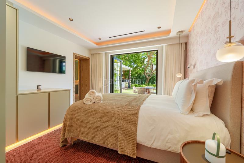 Foto 7b771761-03da-4be8-956f-b21b385eb419. Casa con parcheggio piscina in Puerto Banús Marbella