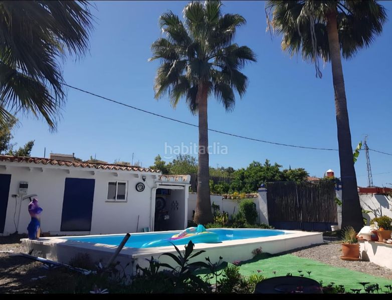 Foto 8a94ea03-a28e-4aff-adc2-650dda751c13. Casa amb piscina a Coín