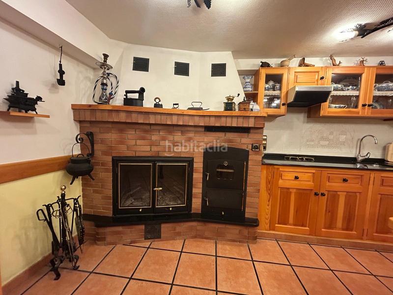 Foto c251f2f0-f1cb-473d-afe4-caa9ea80c77d. Casa adossada amb xemeneia calefacció a Baños de Río Tobía