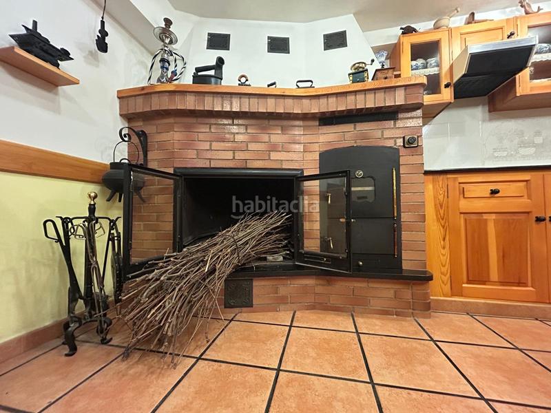 Foto e39298ac-37e7-4da3-981b-98ebf4eea983. Casa adossada amb xemeneia calefacció a Baños de Río Tobía