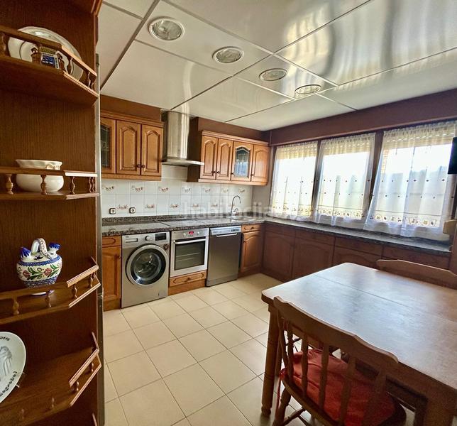 Foto e74a7d71-e727-4aa6-81e3-1c7f6aa12454. Casa adossada amb xemeneia calefacció a Baños de Río Tobía