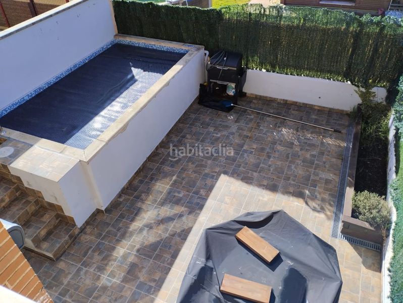 Foto 4acb8a5e-c4f2-4c6b-9c6f-1e2060f1ae2c. Casa adossada amb calefacció aparcament piscina a Sojuela