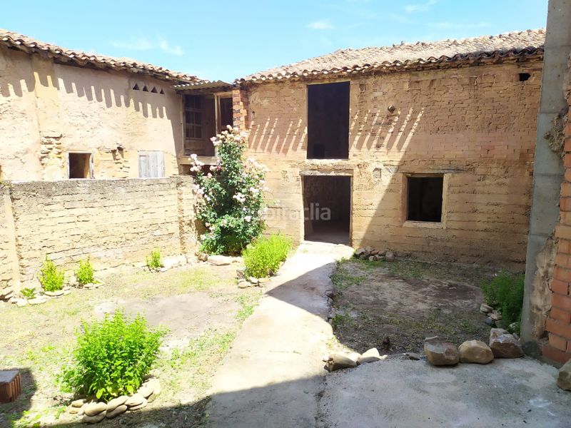 Foto 516f8c77-38d7-479e-bfab-363fac55f996. Casa adossada amb aparcament a Redal (El)