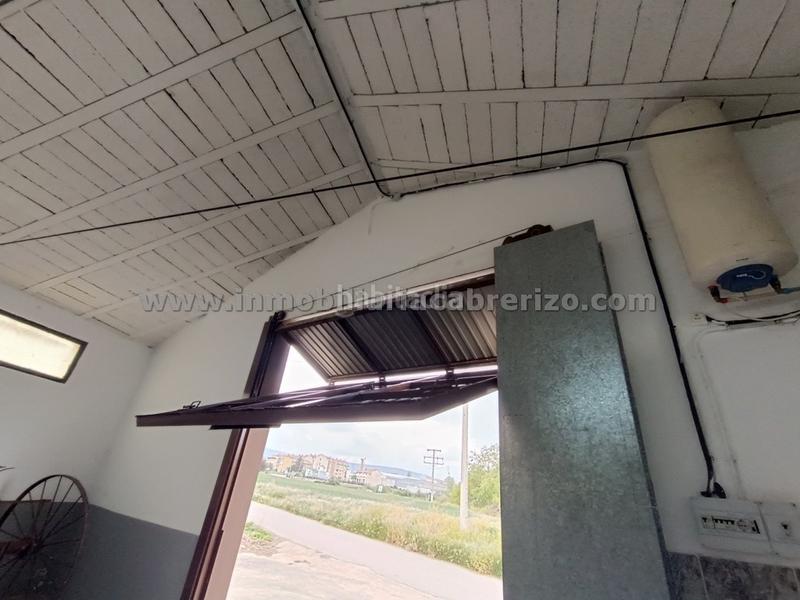 Foto 3eec6083-9827-48d3-a96c-fb006b48875c. Terreno residencial terreno urbanizable con pabellón en Navarrete