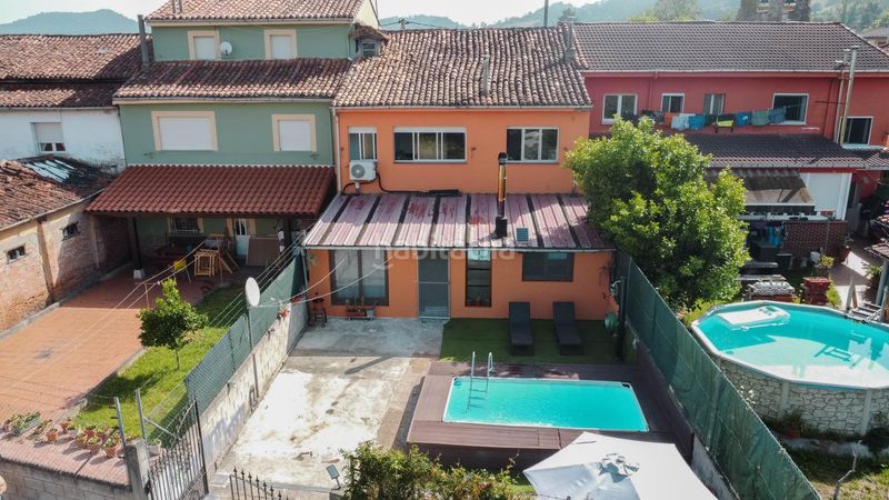 Foto 763b83e0-b78f-4791-a8fe-d109b6a306ce. Casa adossada amb piscina a Grado