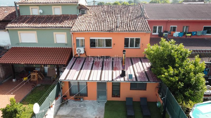 Foto ae7c2611-45f4-46ac-a77c-b76f27820339. Casa adossada amb piscina a Grado