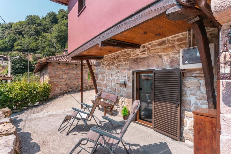 Foto f8762403-1003-4bcb-8ca8-4dcde6fdbb2c. Casa amb calefacció a Somiedo