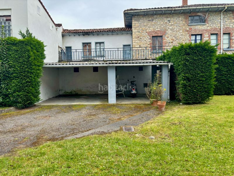 Foto 2bfd839f-ebd9-4f50-ac13-9ef99ae1dea1. Edificio  en venta, más nave, más zona ajardinada y parking en Piloña