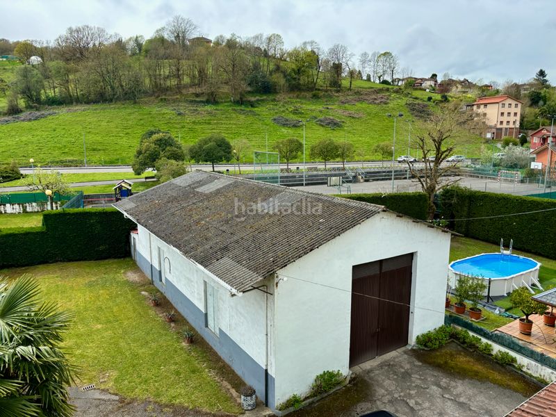 Foto c1f08fc1-d9f9-4ca1-a3d7-08a8792483d5. Edificio  en venta, más nave, más zona ajardinada y parking en Piloña