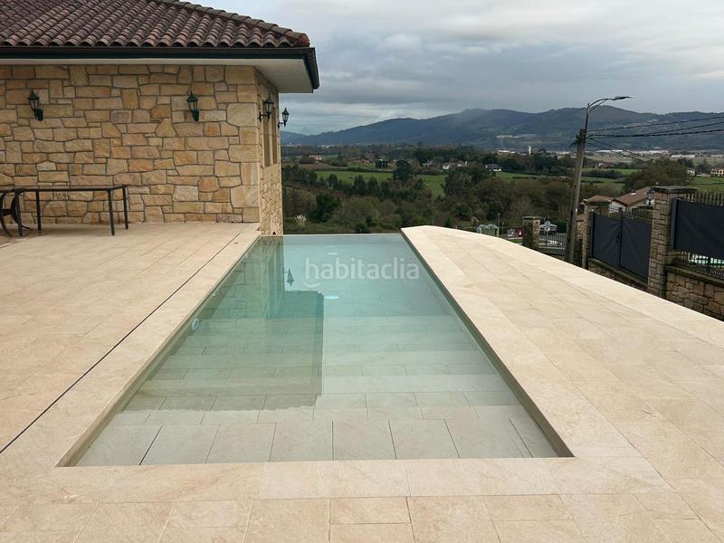 Foto 1f335217-d3d0-4198-820e-5332a0ec451b. Chalet avec chauffage parking piscine dans Loiu