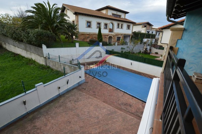 Foto ced7a01c-e58c-4e8c-9ac3-09dfb96c1b27. Casa adossada amb calefacció aparcament piscina a Bareyo