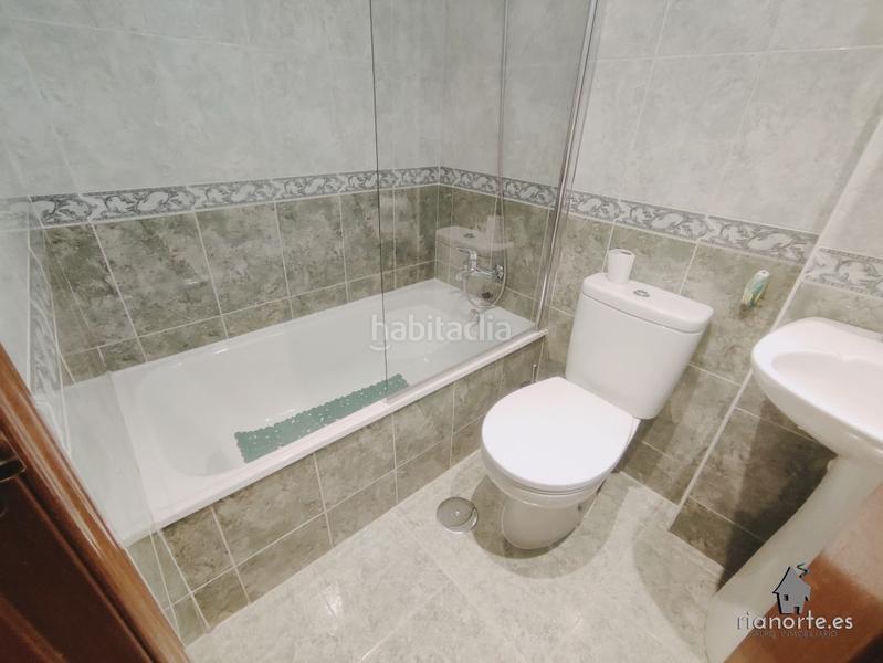 Foto af6d5820-7284-443d-9341-0748cde3f5e1. Casa adossada amb calefacció aparcament a La Felguera Langreo